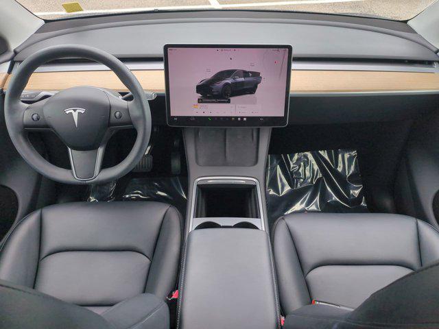 used 2024 Tesla Model Y car, priced at $34,598