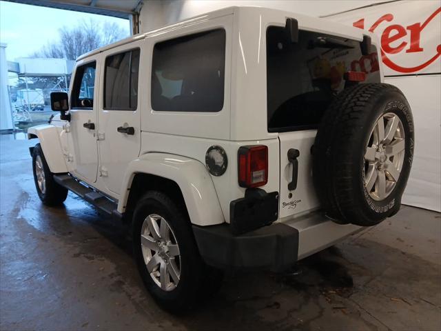 used 2015 Jeep Wrangler Unlimited car, priced at $19,435