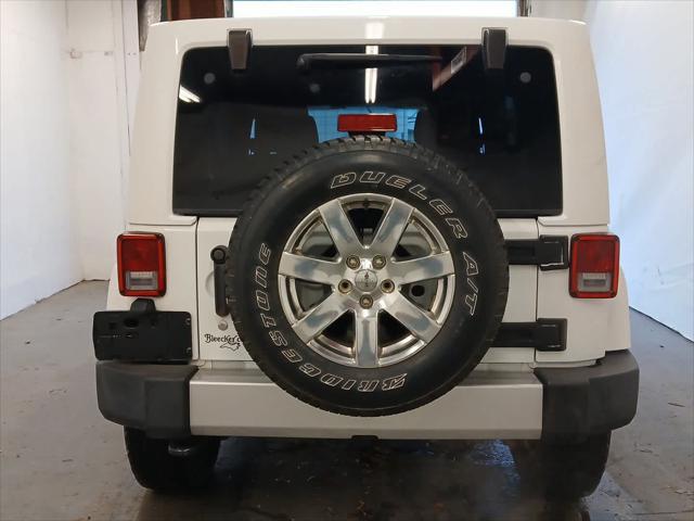 used 2015 Jeep Wrangler Unlimited car, priced at $19,435