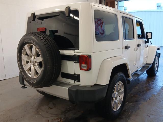 used 2015 Jeep Wrangler Unlimited car, priced at $19,435