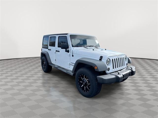 used 2013 Jeep Wrangler Unlimited car, priced at $17,998