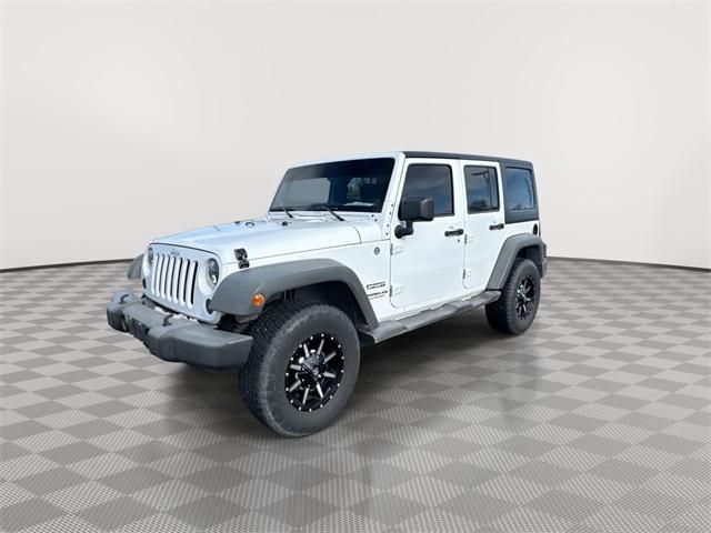 used 2013 Jeep Wrangler Unlimited car, priced at $17,998