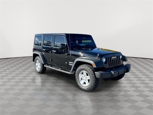 used 2015 Jeep Wrangler Unlimited car, priced at $20,396