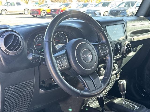 used 2015 Jeep Wrangler Unlimited car, priced at $20,396