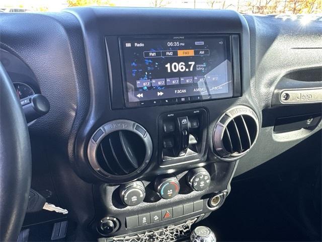 used 2015 Jeep Wrangler Unlimited car, priced at $20,396