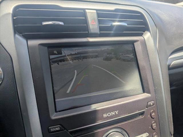 used 2016 Ford Fusion car, priced at $9,030