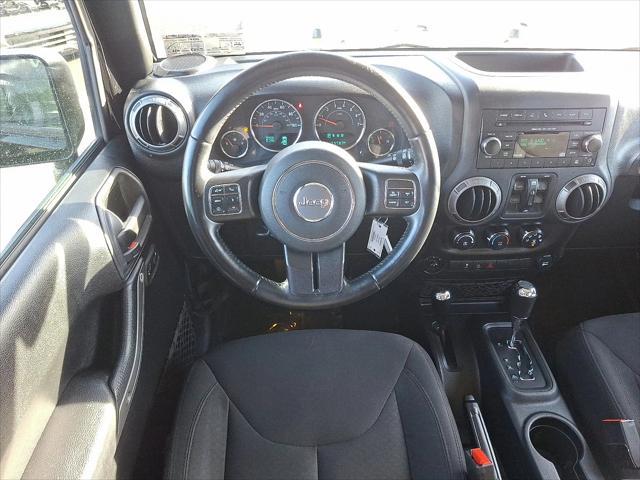 used 2018 Jeep Wrangler JK Unlimited car, priced at $19,999