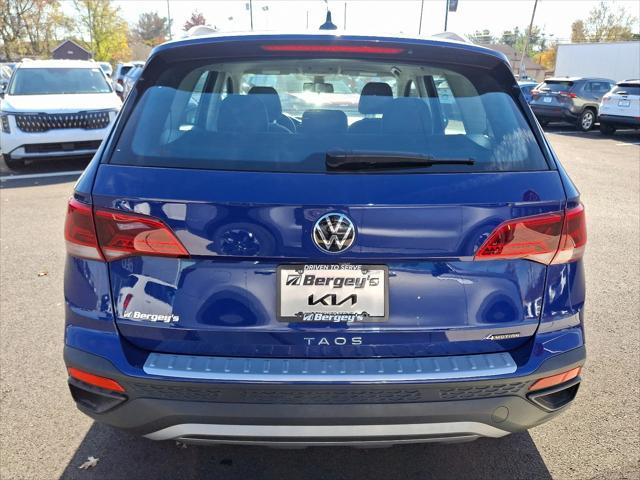 used 2022 Volkswagen Taos car, priced at $20,459