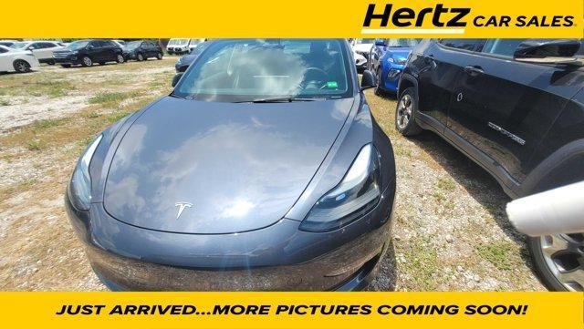 used 2023 Tesla Model 3 car, priced at $25,610