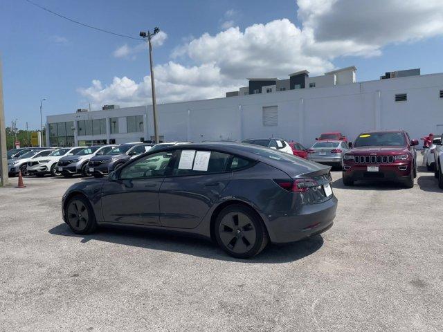 used 2022 Tesla Model 3 car, priced at $29,057