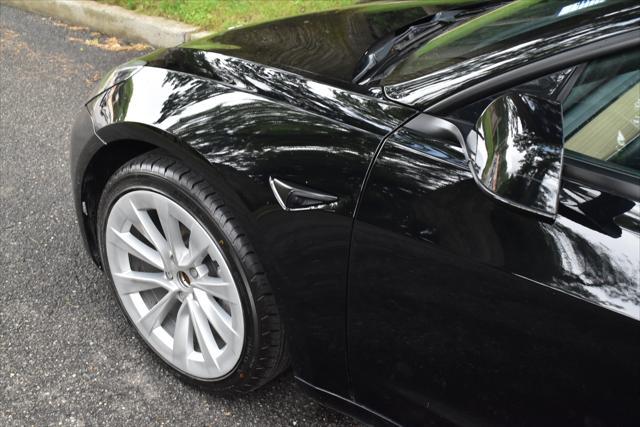 used 2022 Tesla Model 3 car, priced at $24,595