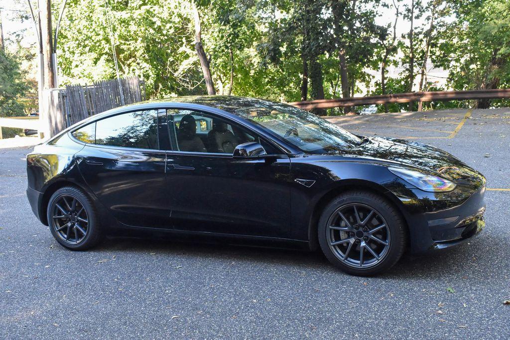 used 2023 Tesla Model 3 car, priced at $14,695