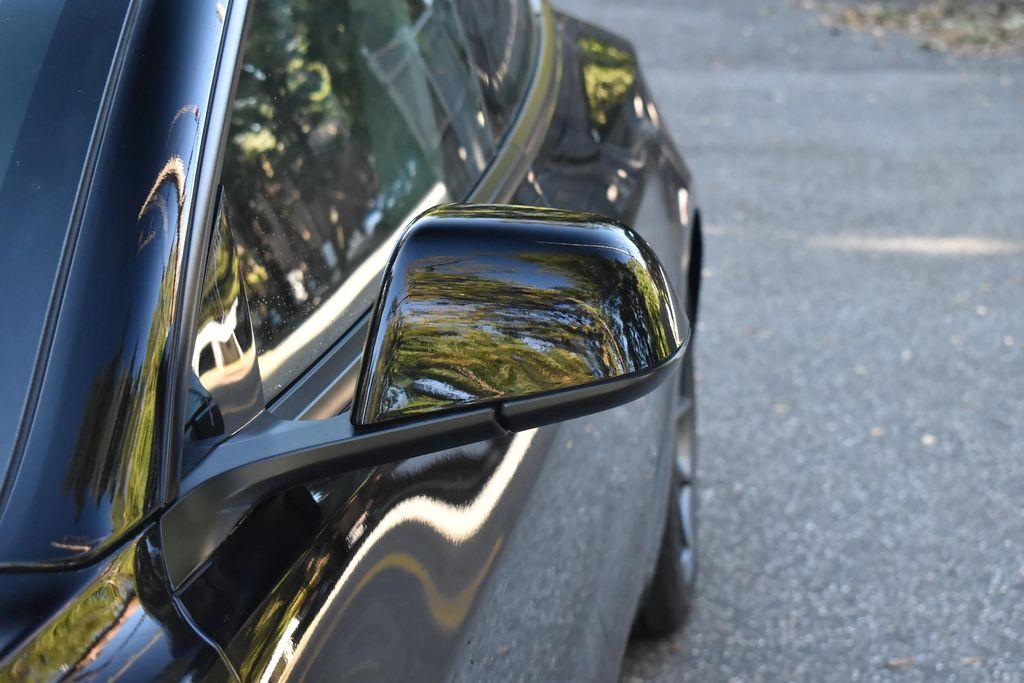used 2023 Tesla Model 3 car, priced at $14,695