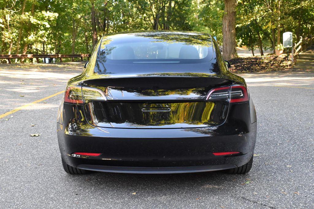 used 2023 Tesla Model 3 car, priced at $14,695