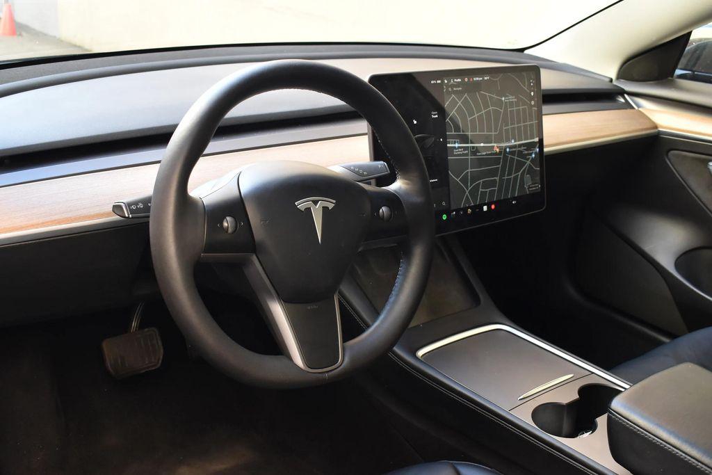 used 2023 Tesla Model 3 car, priced at $14,695