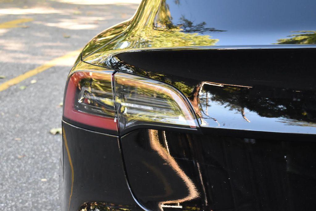 used 2023 Tesla Model 3 car, priced at $14,695