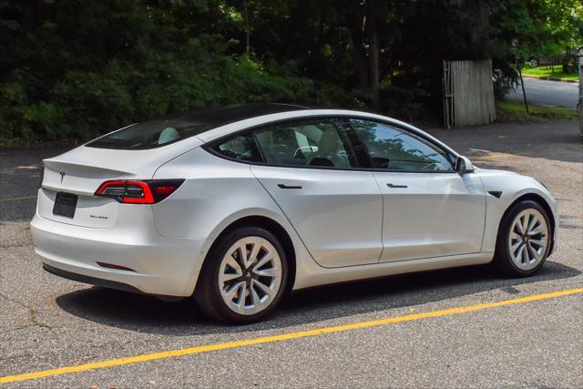 used 2022 Tesla Model 3 car, priced at $18,495