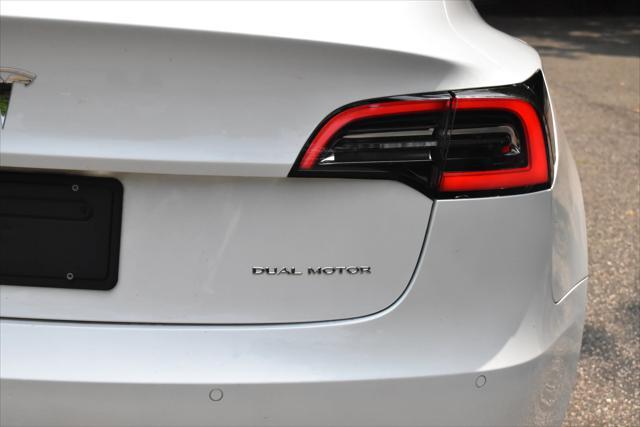 used 2022 Tesla Model 3 car, priced at $18,495