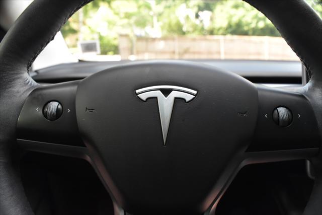 used 2022 Tesla Model 3 car, priced at $17,395