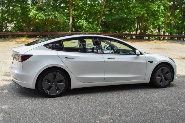 used 2022 Tesla Model 3 car, priced at $17,395