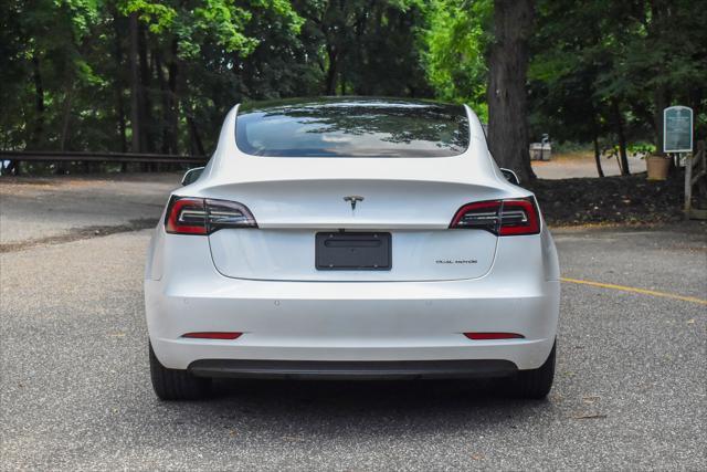 used 2022 Tesla Model 3 car, priced at $17,395