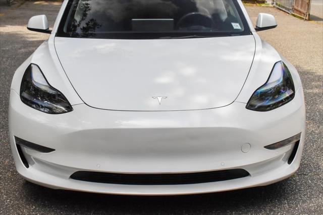 used 2022 Tesla Model 3 car, priced at $17,395