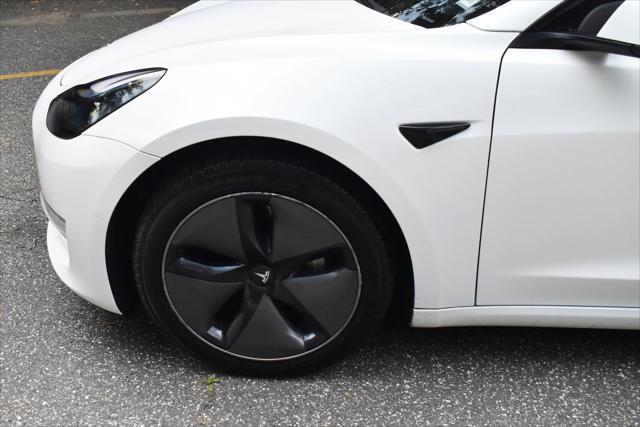used 2022 Tesla Model 3 car, priced at $17,395