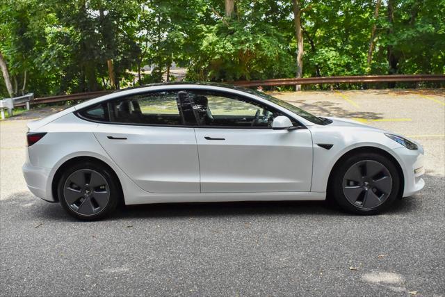 used 2022 Tesla Model 3 car, priced at $17,395