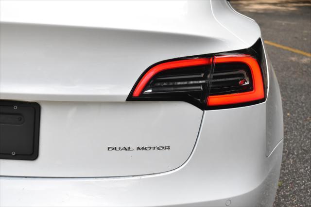 used 2022 Tesla Model 3 car, priced at $17,395