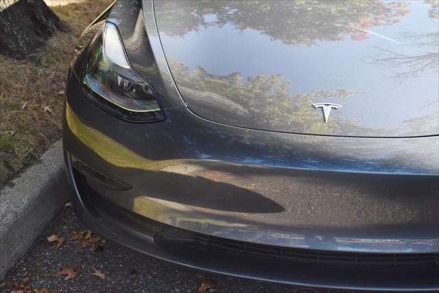 used 2022 Tesla Model 3 car, priced at $34,595