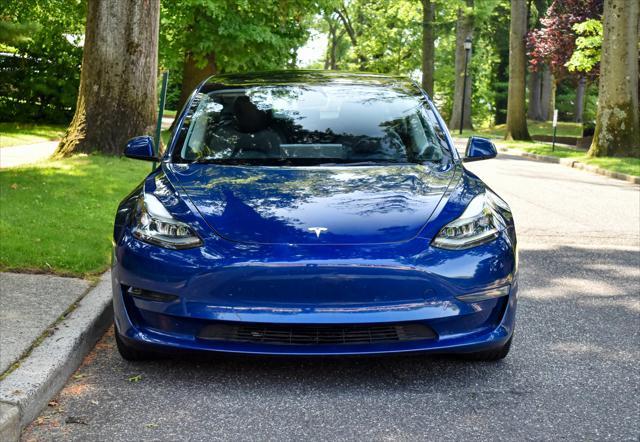 used 2023 Tesla Model 3 car, priced at $20,595