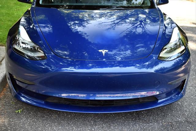 used 2023 Tesla Model 3 car, priced at $20,595