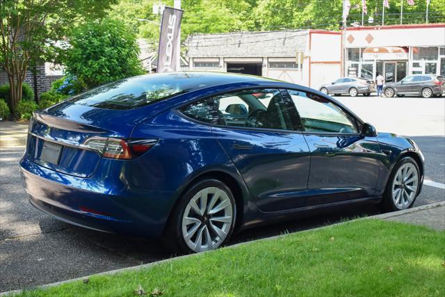 used 2023 Tesla Model 3 car, priced at $20,595