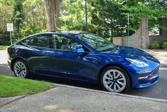 used 2023 Tesla Model 3 car, priced at $20,595