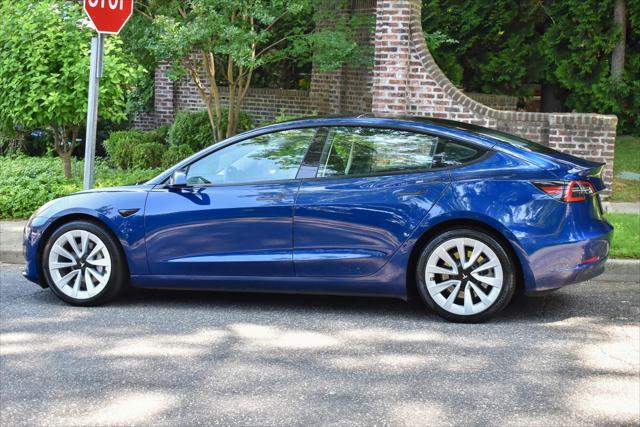 used 2023 Tesla Model 3 car, priced at $20,595