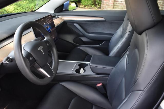 used 2023 Tesla Model 3 car, priced at $20,595