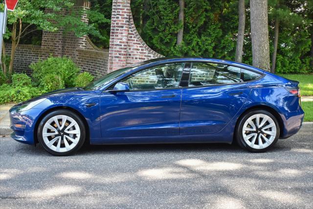 used 2023 Tesla Model 3 car, priced at $20,595