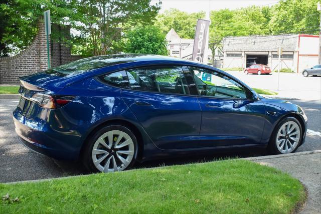 used 2023 Tesla Model 3 car, priced at $20,595