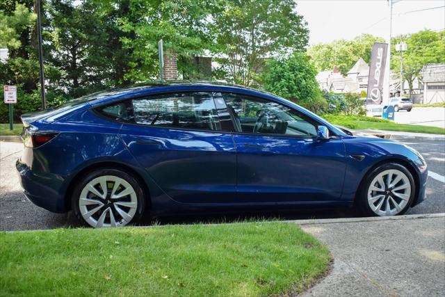 used 2023 Tesla Model 3 car, priced at $20,595