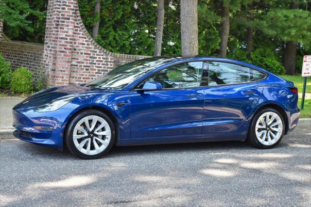 used 2023 Tesla Model 3 car, priced at $20,595