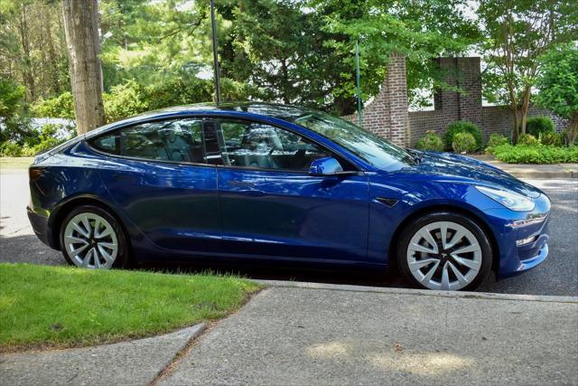 used 2023 Tesla Model 3 car, priced at $20,595