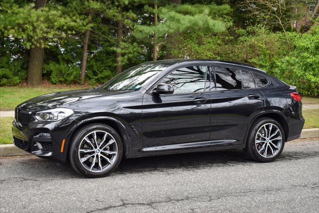 used 2021 BMW X4 car, priced at $33,895