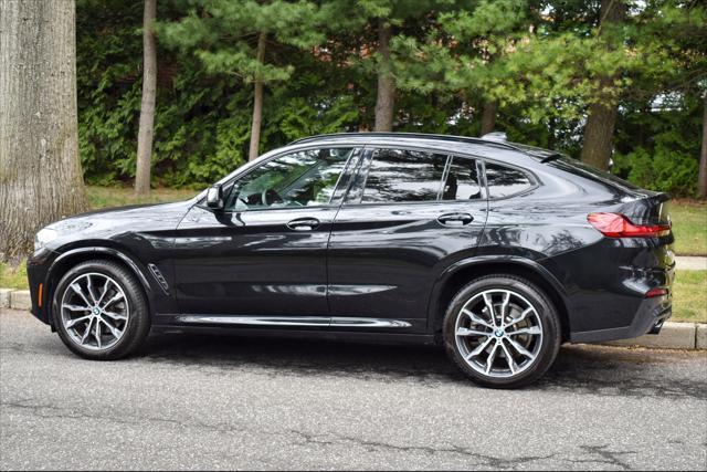 used 2021 BMW X4 car, priced at $33,895