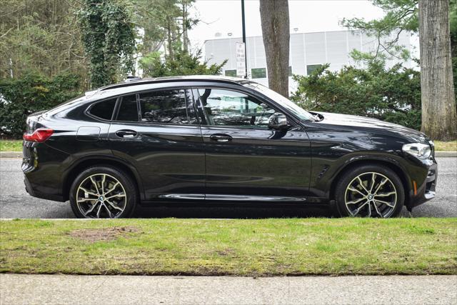 used 2021 BMW X4 car, priced at $33,895