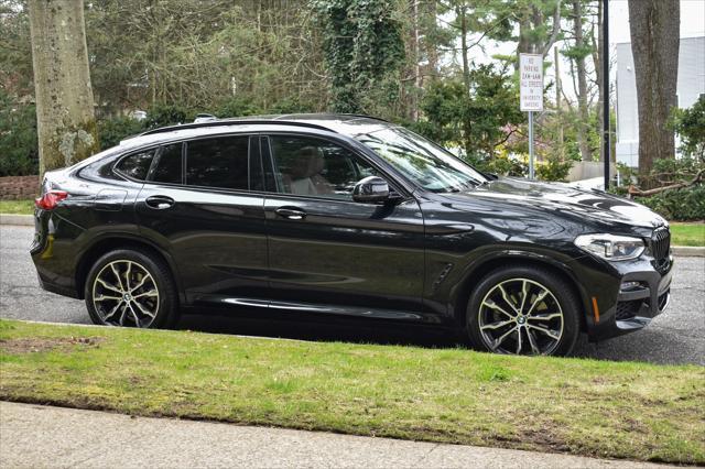 used 2021 BMW X4 car, priced at $33,895