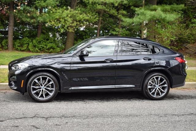 used 2021 BMW X4 car, priced at $33,895