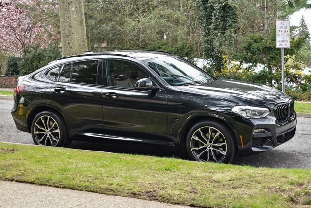 used 2021 BMW X4 car, priced at $33,895