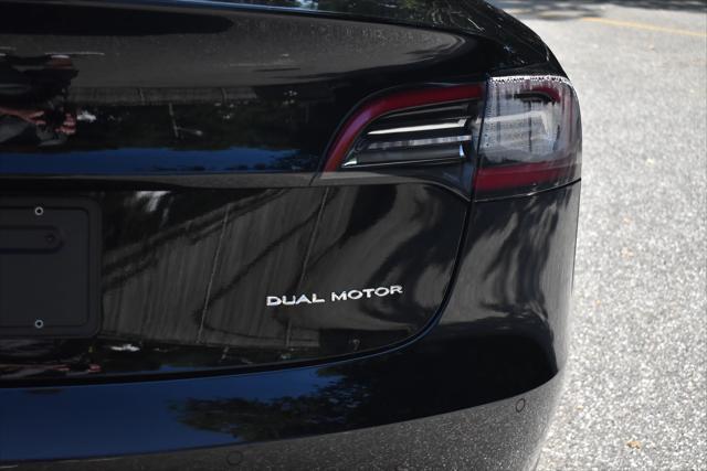 used 2022 Tesla Model 3 car, priced at $20,995
