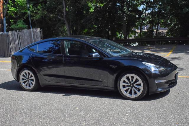 used 2022 Tesla Model 3 car, priced at $20,995