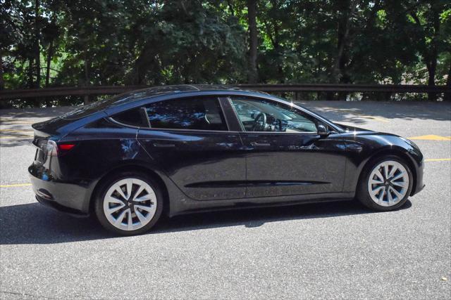 used 2022 Tesla Model 3 car, priced at $20,995